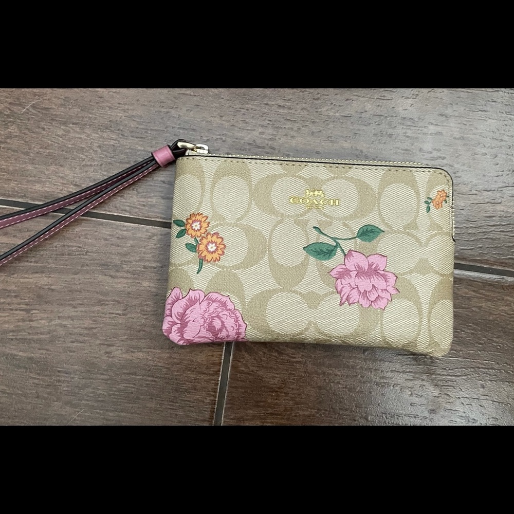 Authentic Coach floral wristlet